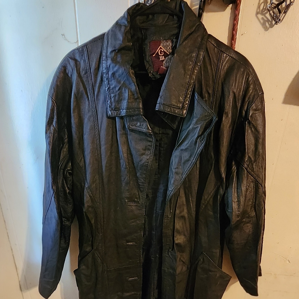 G-III Women's black leather trench coat.